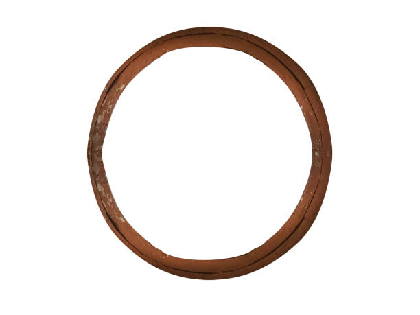 istock Round wooden old weathered 19th century window isolated on white background. 1743944810