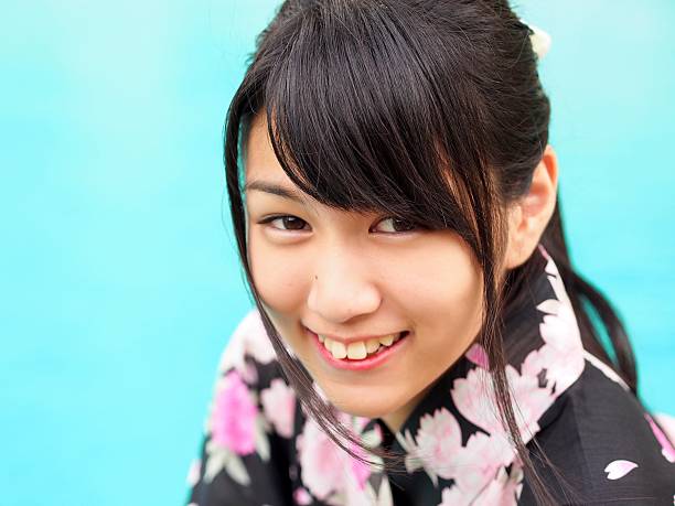 istock Smiling kimono girl 174395099