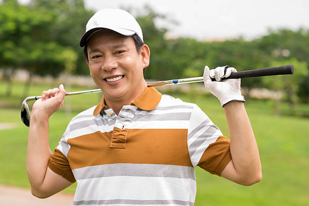 istock A happy golf player enjoying the game 174395929