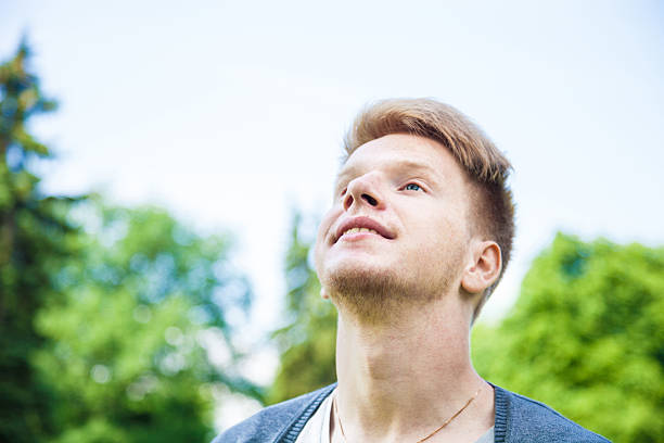 istock Carefree guys looking up 174397422