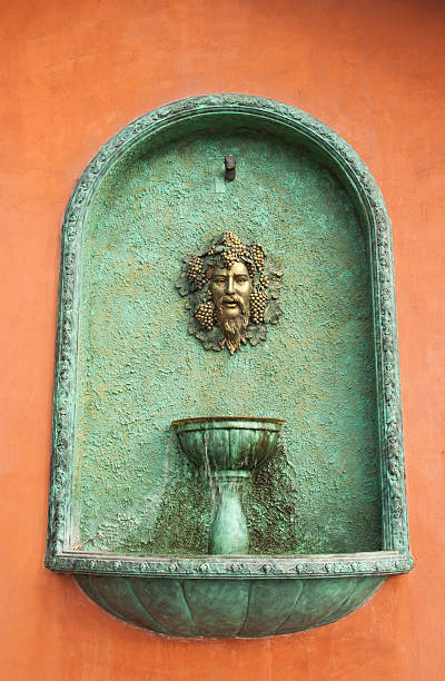 European style artwork on orange concrete wall