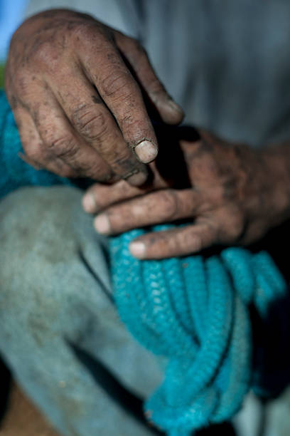 istock Dirty hands covered in grease and dirt 174398016