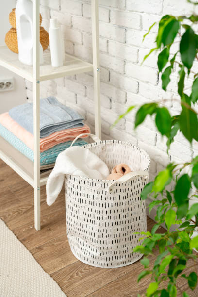 istock Fabric laundry basket in a bathroom close up 1743980922