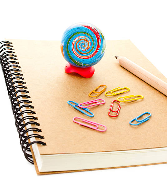 istock School supplies with art Globe, clip and notebook 174398172