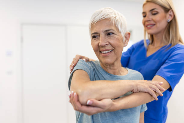istock Professional therapists is stretching muscles, senior patient with abnormal muscular symptoms, physical rehabilitation therapies and treatment of physiological disorders by physiotherapists concept. 1743986061