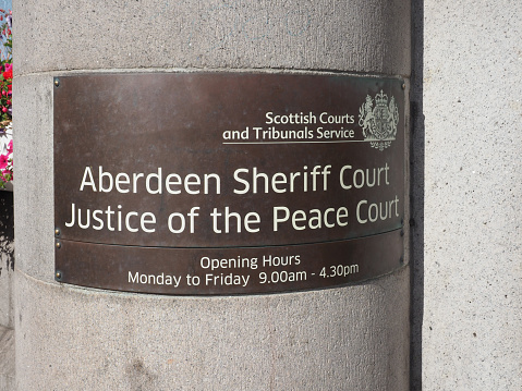 Aberdeen, UK - September 14, 2023: Aberdeen Sheriff Court Justice of the Peace Court sign