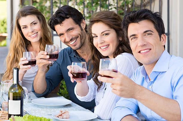 istock Friends Cheering With Wine Glasses 174400952