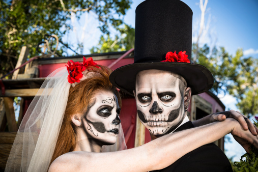 Characters: Skeleton bride wraps arms around groom. Spooky Halloween wedding.  SEE MORE LIKE THIS... Similar images in lightboxes below.  