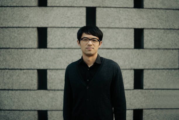 istock Asian man outdoor portrait 1744039575