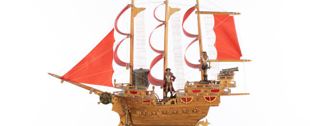 istock pirate ship with red sails isolated on white background 1744046286