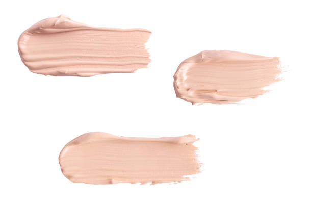 istock A smear of foundation cream or concealer isolated on white background, macro. Texture of cosmetic liquid foundation or beige cream smudge, smear, stroke. 1744064138