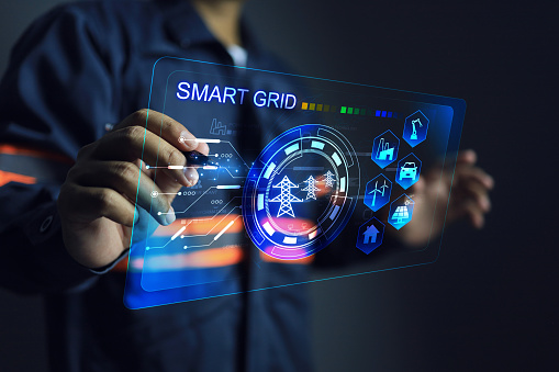 Smart grid concept with electric power Industry and electrical engineer operating control panel distributor dashboard on grid distribution network