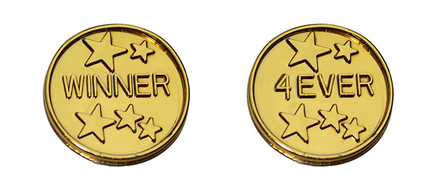 two shiny gold coins with golden stars and the words WINNER and 4EVER, forever, for business, advertising, soccer football sport event and fun wedding game or funny children party isolated on white background