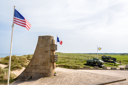 Vierville-sur-Mer, France - Apr 24, 2024: Omaha Beach D-Day. Normandy landings during Second World War. Cloudy spring day. Selective focus