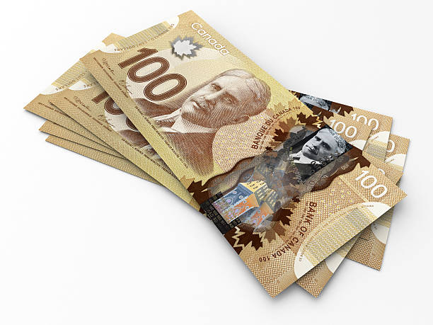 los billetes de cien dólares canadienses - canadian currency fotografías e imágenes de stock