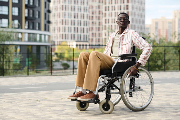 istock Man with disability walking in the city 1744116919