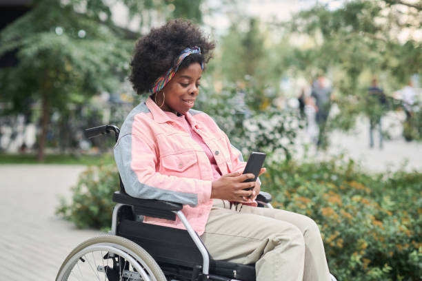 istock Woman with disability communicating online 1744118214