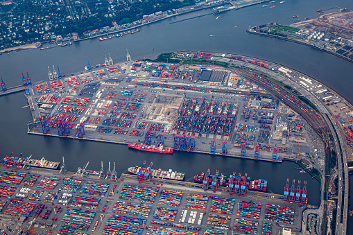 Hamburg, Germany - September 22, 2015: aerial of Hamburg harbor with container and ships at pier.