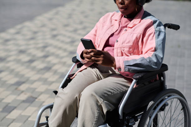 istock Woman with disability walking outdoors 1744118767