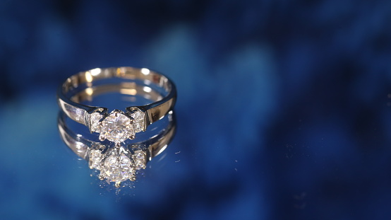 diamond  ring on blue  background