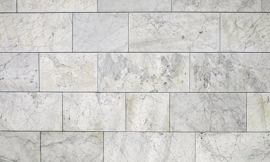 White and gray marble tiles for outdoors. Background and texture.