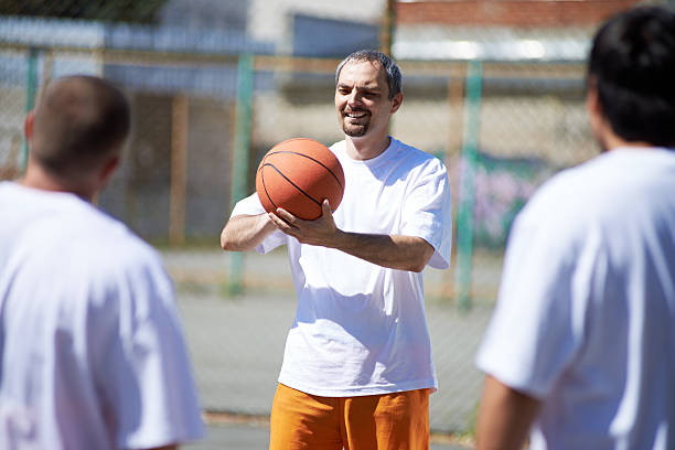 Prisoners spending time playing basketball