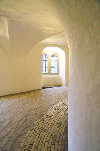 istock Sun shines through the window in an empty Round Tower (Rundetaarn) in Copenhagen, Denmark 1744191420