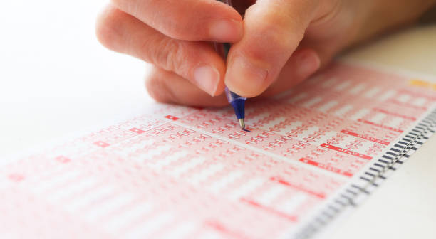 istock Making prediction by choosing numbers on a Lotto ticket. 1744210087