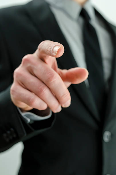 istock Businessman pointing finger at you 174421081