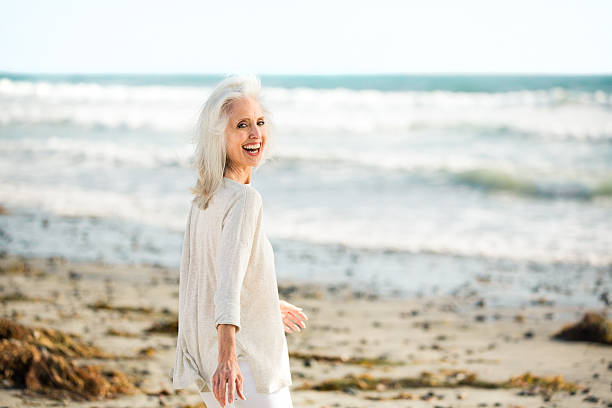 istock Beautiful senior woman on a beach. 174422177