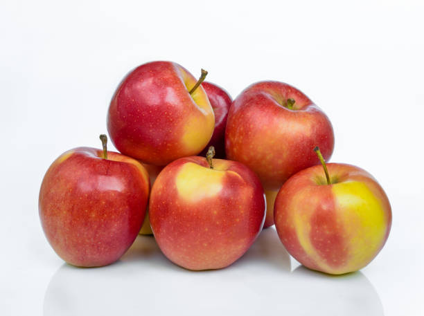 istock Bunch of ripe Gala apples isolated on white background 1744238689
