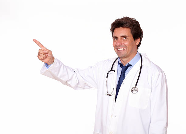 istock Professional medical doctor pointing up copyspace 174426589