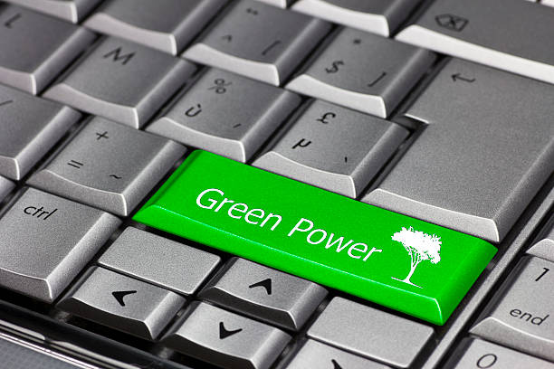 green power on a keyboard key stock photo