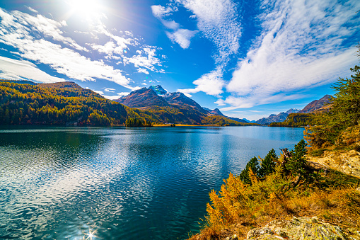 Lake Sils Maria, in the Engadine, photographed in autumn, with its landscape and the mountains above it.