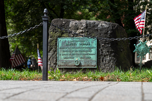 New York, USA - August 16, 2015: Names of the victims of attacks inscribed on the parapets surrounding the waterfalls of National September 11 Memorial.