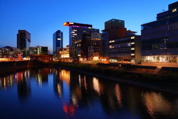 istock Dusseldorf city night skyline 1744283157