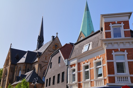 Old buildings in downtown Cologne, Germany on a sunny day.