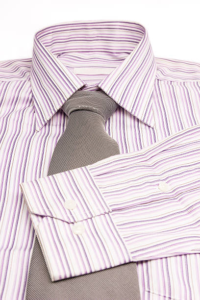 istock pink shirts isolated on white 174429081