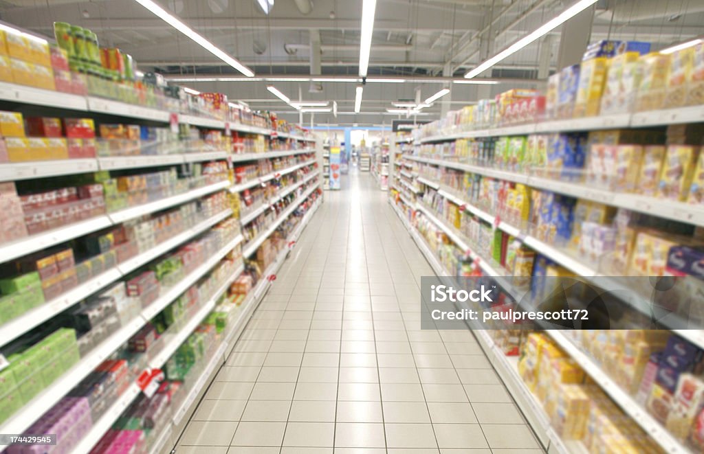 supermarket perspective Wide perspective of empty supermarket aisle Supermarket Stock Photo