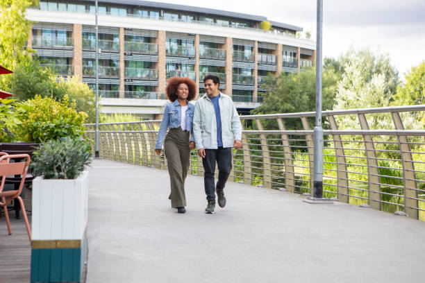 istock Young couple walking in a town 1744305047