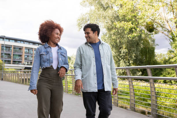 istock Young couple walking in a town 1744305590