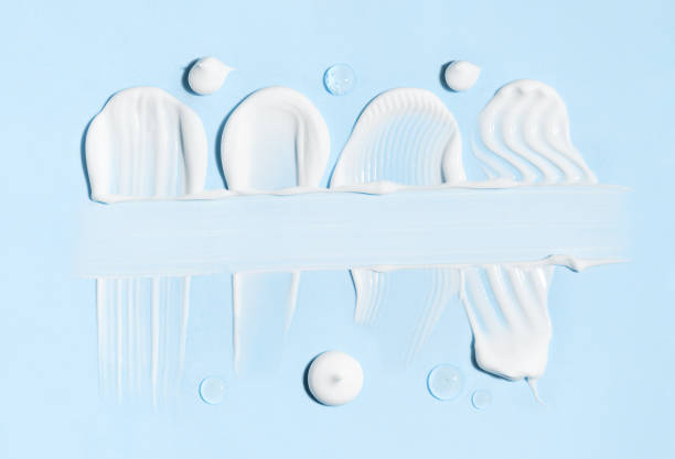 istock cosmetic smears cream texture on pastel blue background with space for text 1744307395
