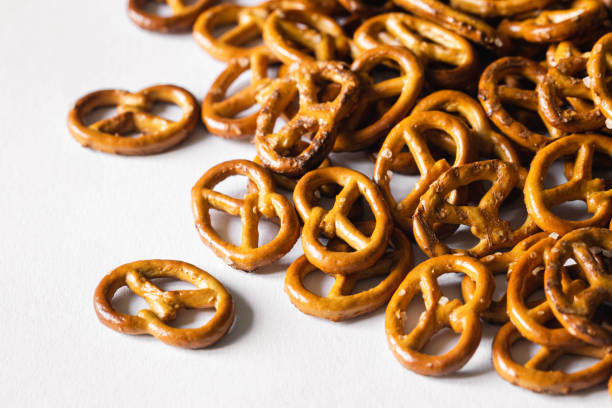 istock Salted mini pretzels on a white background isolated. 1744313818