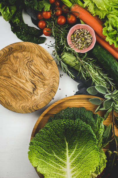 istock Assortment of fresh vegetables on a wooden table. 1744325148