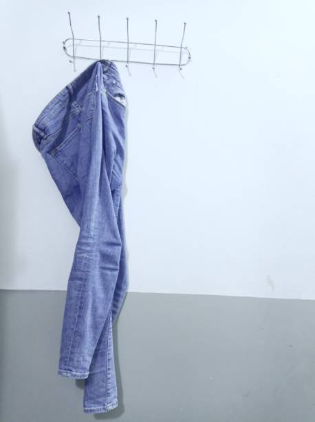 istock Jeans hanging on the hanger 1744326325