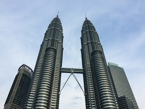 Kuala Lumpur, Malaysia - Jul 6, 2015. Petronas Twin Towers in Kuala Lumpur, Malaysia. The Towers were the tallest buildings in the world from 1998 to 2004.