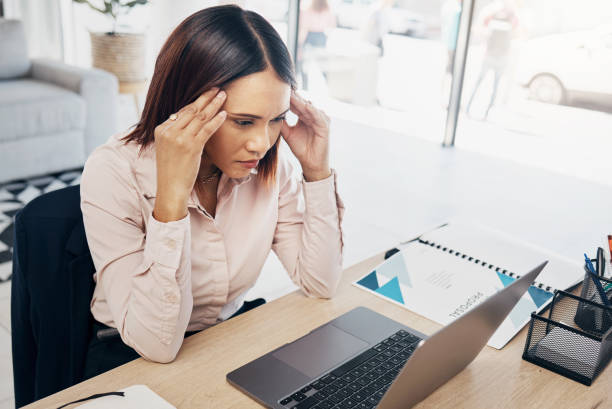 istock Business, laptop and woman with burnout, headache and depression with a deadline, glitch and stress. Person, worker and employee with a pc, migraine and mental health with tension, strain and anxiety 1744347345