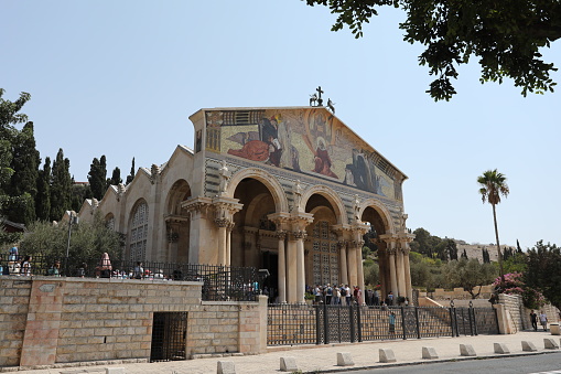 Jerusalem, Israel - 09 21 2017: Tourists and pilgrims are visiting Church of All Nations in Jerusalem Old City. The Jerusalem Old City is home to several sites of key religious importance.