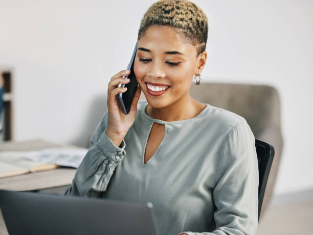 istock Woman, phone call and programmer with connection, laptop and network with communication. Person, employee and trader with smartphone, worker and digital app with investment, savings and conversation 1744367220