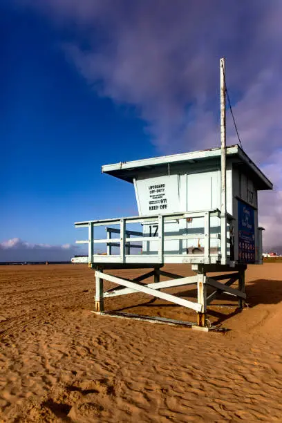 Photo of Vertical photograph of a closed lifeguard hut in the city of Santa Monica in the state of California in the United States of America.